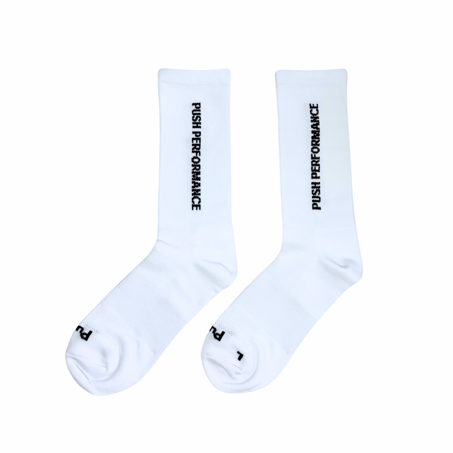 White performance running socks flat lay.