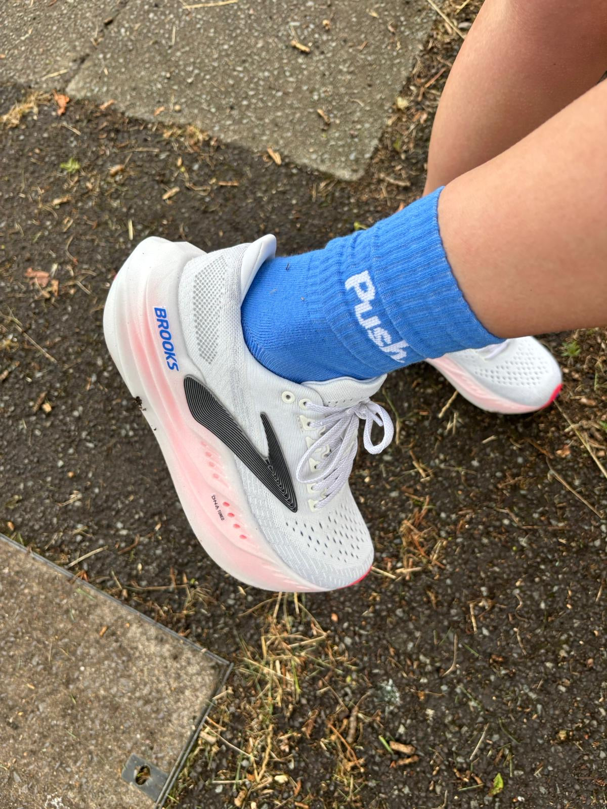 Blue training socks on feet.
