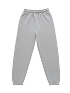 Essential Warm Up Jogger in black from Push Performance, laid flat to show tapered fit and soft fabric finish