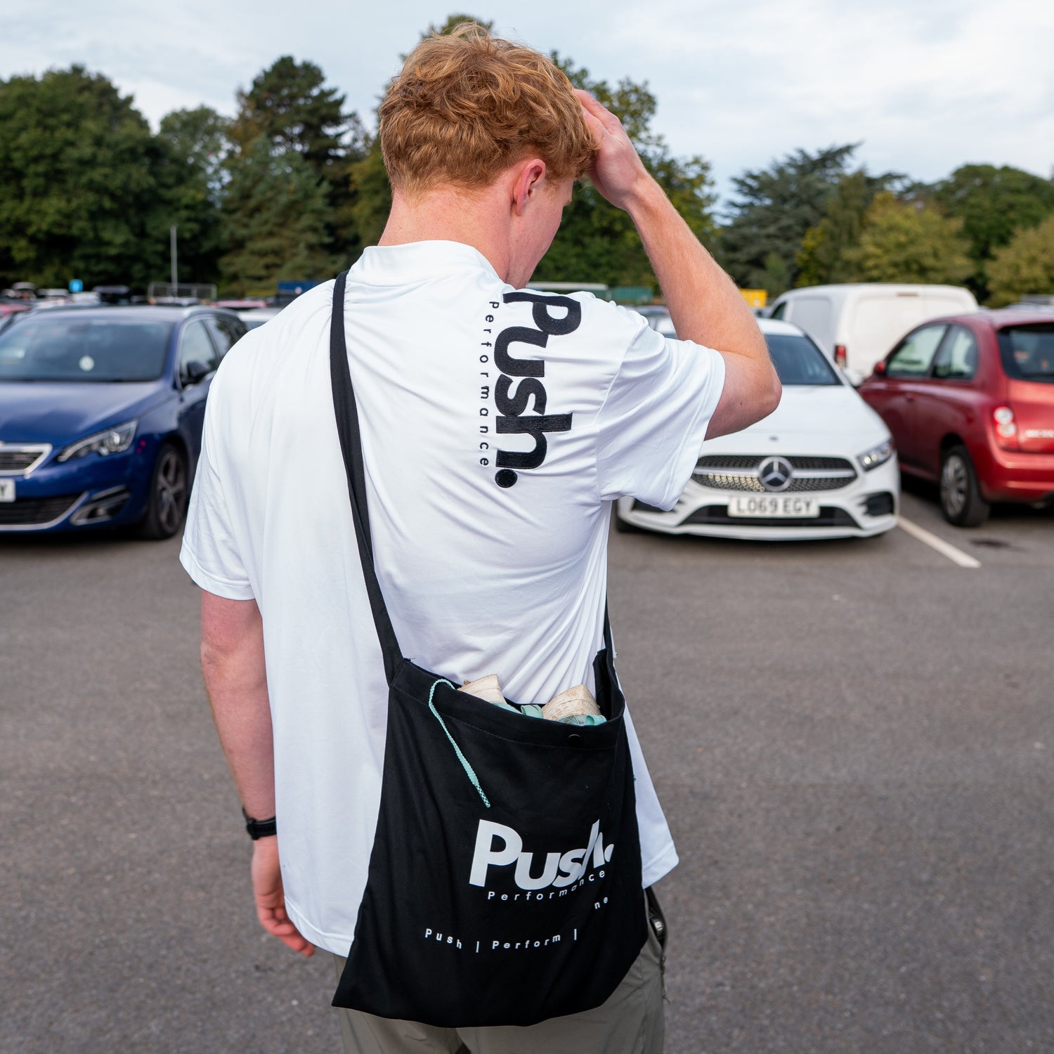 Casual commuter carrying the Musette Bag in an urban setting, blending style and practicality.