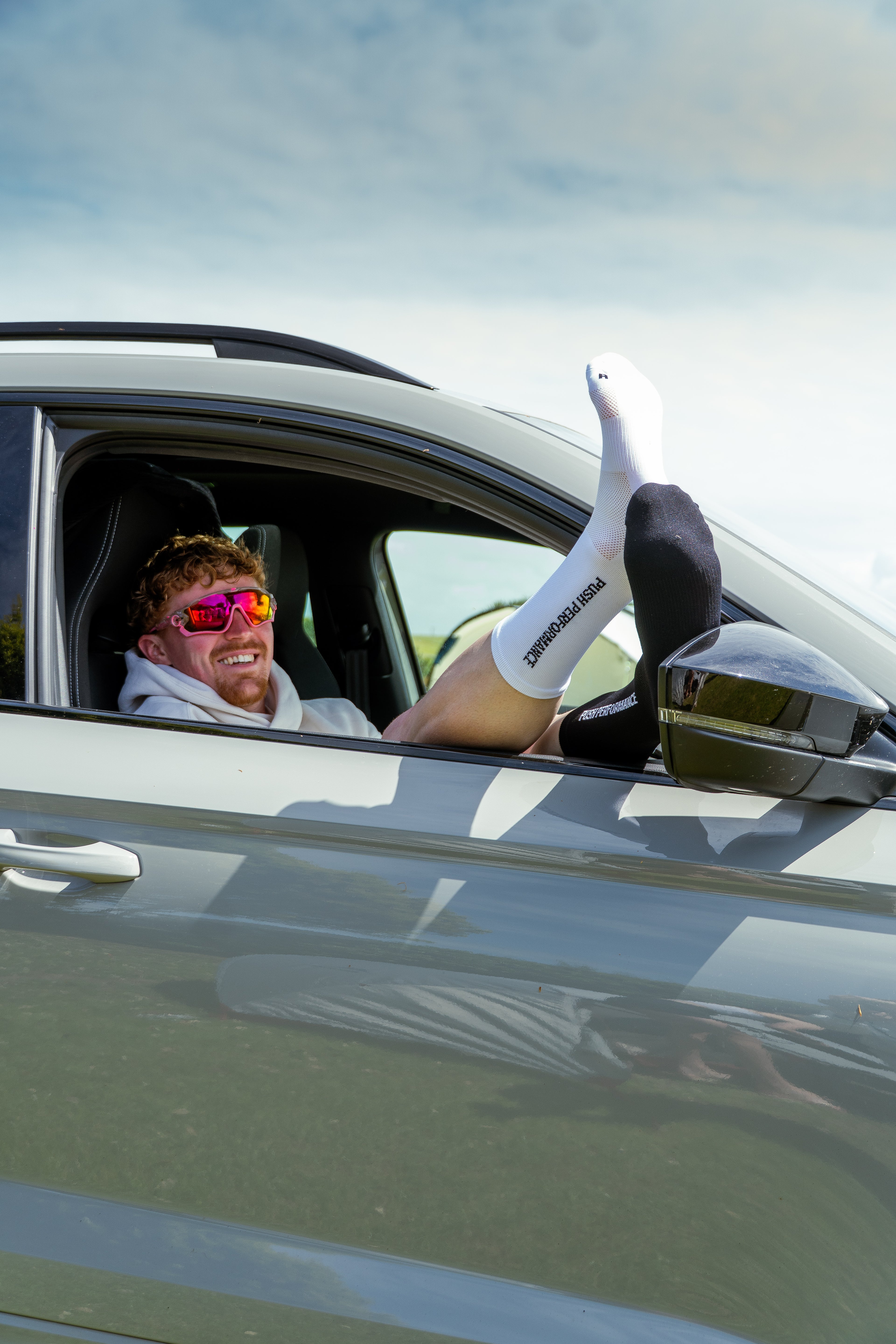 Runner sat waiting with his feet up.