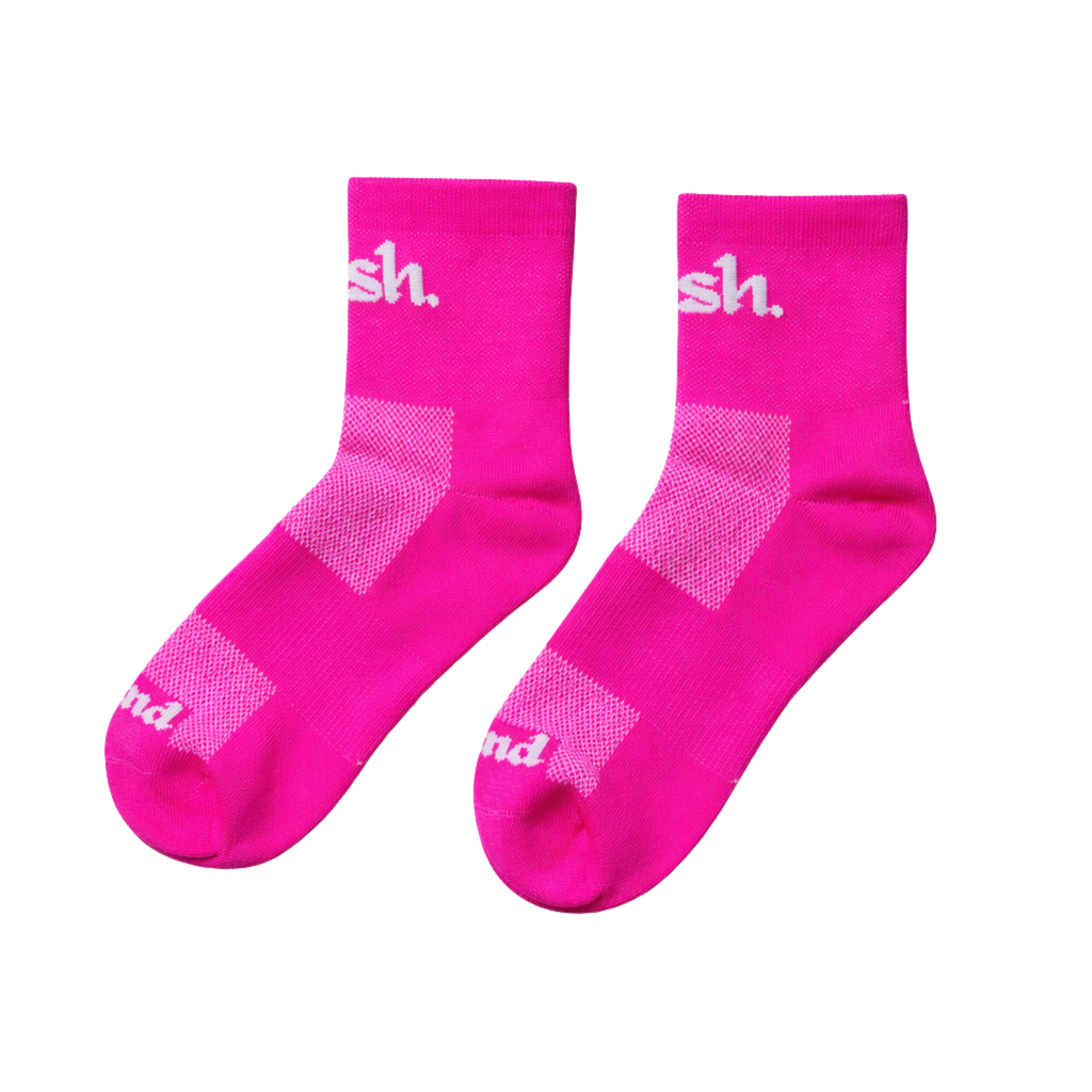 Push Performance pink quarter length running socks on white background 